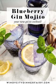 blueberry gin mojits with lemon and mint garnish on the side