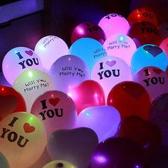 many balloons with i love you written on them