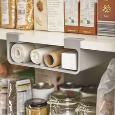 the shelves are filled with different types of food