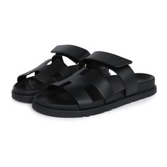 This pair of Chypre Techno sandals are in Black calfskin and feature the iconic H, Black rubber soles, and adjustable straps.Origin: ItalyCondition: New and never wornAccompanied by: Hermes box, two dustbags, ribbonSize: 37 EU Black Double Strap Sandals With Rubber Sole, Black Open Toe Slingback Sandals With Leather Lining, Black Calf Leather Slingback Sandals With Removable Insole, Black Leather Slingback Sandals With Leather Footbed, Black Open Toe Sandals With Leather Lining, Modern Black Slides With Buckle Closure, Black Leather Slingback Sandals With Leather Lining, Luxury Black Slingback Sandals With Single Toe Strap, Modern Black Slides With Open Heel