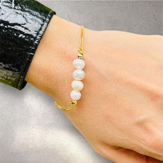 A beautiful and elegant pearl bracelet featuring 4 dainty pearls. This bracelet is great for stacking or worn on its own for a delicate and minimalist look! Also makes a great gift for bridesmaids! ⭐ Buy more than one item from our shop and take a price discount:             2   items  :       35% OFF             3   items  :       40% OFF            4+  items  :       45% OFF            6+  items  :       50% OFF For multiple orders please contact me ☎️. You will love the pearl necklace : https Adjustable Pearl Bracelets With Pearl Pendant, Adjustable Bracelet With Pearl Pendant, Adjustable Pearl Bracelet With Pearl Pendant, Adjustable Pearl Bracelet With Pearl Pendant For Wedding, Elegant Adjustable Bracelets With Pearl Pendant, Elegant Adjustable Bracelet With Pearl Pendant, Pearl Bracelet With Pearl Pendant As Gift, Pearl Bracelet With Pearl Pendant For Gift, Elegant Pearl Bracelet With Extender As Gift