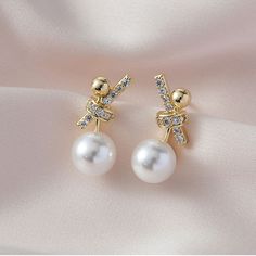 Product Specifications: Pearl Type ShellPearl Shape Round Pearl Color White, Red, ChampagneStock Number 7399Metal 14K Gold plated and S925 Silver PinsFor FemaleWeight 3g Package Includes: 1 x Hugetomato Earrings1 x Box from HugeTomato Dainty Pearl Earrings, Polish Remover, Silver Pin, Nail Polish Remover, Pearl Types, Earrings Drop, Plated Ring, Gold Plated Rings, Pearl Color