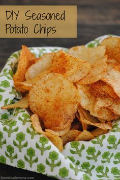 homemade seasoned potato chips on a green and white cloth