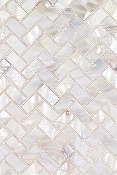 an image of a white mosaic tile pattern that looks like it is made from mother of pearl