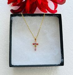 **A beautiful Dainty Cross Cubic Zirconia stones birthstone charm necklace with  gold-filled chain. Perfect for a birthday ** 16 Gold Filled chain** 5x4mm CZ Cross Pendant ** A friendly reminder in taking care of the chain - the chain will fade if exposed in water, chemicals, perfume, or even sometimes perspiration ** Birthday 16, Birthstone Charm Necklace, Necklace Birthstone, Friendly Reminder, Birthstone Charms, Birthstone Necklace, Dainty Necklace, Gold Filled Chain, Cross Pendant