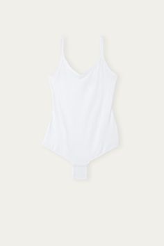 Tank style V-neck bodysuit in Supima® ultralight cotton. Snap button closure and 100% cotton inner gusset. Summer Loungewear Bodysuit With Built-in Bra, Stretch Cotton Bodysuit With Lined Body, Cotton Loungewear Bodysuit, Classic Cotton Fitted Bodysuit, Seamless Camisole Bodysuit For Loungewear, Summer Short Sleeve Bodysuit With Lined Body, Cotton Bodysuit For Loungewear, Seamless Sleeveless Cotton Bodysuit, Sleeveless Seamless Cotton Bodysuit