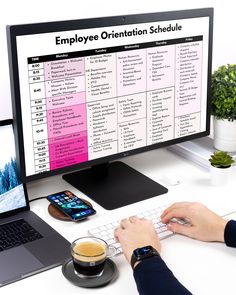 a person typing on a keyboard in front of a computer screen with an employee organization schedule