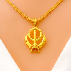 22k-gold-bold-khanda-pendant Yellow Gold Hallmarked Pendant Temple Necklace, 22k Yellow Gold Hallmarked Temple Necklace, Festival Yellow Gold Jewelry With Large Pendant, 22k Gold Symbolic Pendant Necklace, Hallmarked Yellow Gold Necklace For Diwali, Symbolic Yellow Gold Jewelry For Puja, Symbolic 22k Gold Pendant Necklace, Yellow Gold Plated Temple Necklace, Hallmarked Yellow Gold Plated Temple Necklace