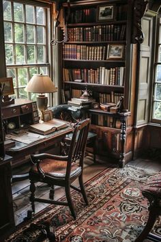 an old fashioned desk and chair in front of a large bookcase filled with books