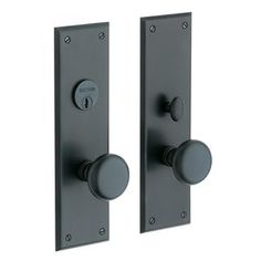 an image of two door handles with knobs