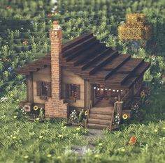 a small house in the middle of a lush green field with flowers and trees around it