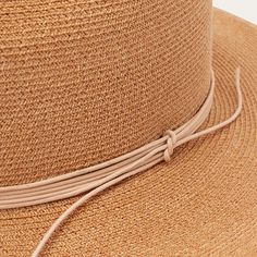 The Magic Eye Straw Hat is crafted from high-quality 100% shantung straw. It has a 3” brim and a 4” x 5 1/2” sloped Gus crown—a classic statement making western style. It’s complemented by a silk cord hat band and Stetson hat. A genuine leather sweatband for a time-tested fit and all-day comfort. Handmade in the U.S.A. with the finest construction and materials, our straw hats are made to stand the test of time. 4” x 5 1/2” Gus Crown 3” Brim Silk Cord Hat Band Stetson Hat Pin Genuine Leather Swe Elegant Flat Brim Sun Hat For Country Events, Elegant Fedora Sun Hat For Country Events, Elegant Straw Hat For Country Events, Elegant Toquilla Straw Hat For Country Events, Western Straw Boater Hat With Short Brim, Western Style Straw Boater Hat With Short Brim, Straw Boater Hat With Wide Brim For Rodeo, Elegant Natural Straw Hat For Rodeo, Wide Brim Panama Hat For Country Events