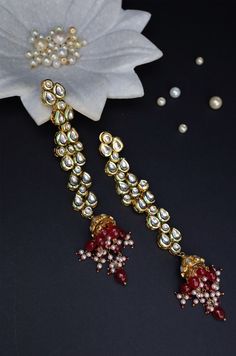 These earrings are a traditional piece rendered in contemporary style and a perfect conversation starter for every occasion you grace. Closure - Push Back Style Tip - Wear this with almost anything Indian for a rich and royal look because nothing more regal than kundan earrings. We love teaming this with classy chiffon sarees or zari silk sarees. Also looks best when worn with your royal whites, off whites and gold. We recommend styling with bold solids or floral dresses in peachy pink, pistachi Fusion Style Kundan Danglers For Festivals, Fusion Kundan Danglers For Festivals, Fusion Style Jhumkas With Gota Work For Festivals, Fusion Style Festive Jhumkas With Gota Work, Fusion Chandbali Jhumkas With Gota Work, Festive Dual-tone Chandbalis, Festive Fusion Jhumkas With Gota Work, Festive Fusion Gota Work Jhumkas, Fusion Style Chandbalis With Gota Work For Diwali