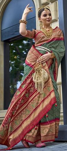 Green, Red and Maroon color Saree in Art Silk fabric with Bandhej, Stone, Thread work Red Bandhani Print Dupatta For Party, Red Anarkali Handloom Sets, Red Handloom Sets For Festivals, Red Zari Weaving Dupatta For Party, Red Anarkali Sets With Handloom Details, Party Banarasi Silk Saree In Red, Red Banarasi Silk Saree For Party, Red Lehenga With Zari Weaving For Party, Red Bohemian Lehenga For Puja