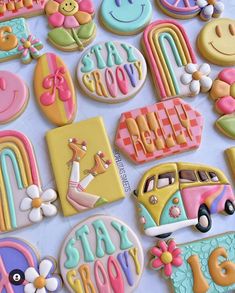 some decorated cookies are laying on a table