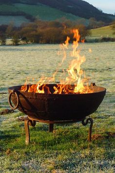 a fire pit with the words, great is the lord and greatly to be praised and his greatness is unsearbable