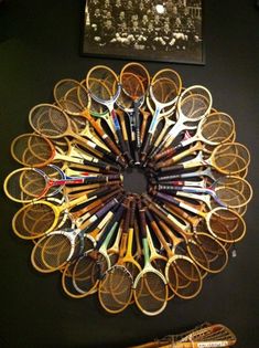 there is a racket wall hanging on the wall