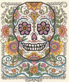 a cross stitch skull with flowers on it's head and the words, day of the