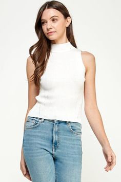 Elevate your style with the Ellison Rib Knit Mock Neck Sleeveless Top. This versatile tank top adds texture and flair to any outfit. The mock neck and sleeveless design give it a modern touch, while the semi-cropped hem adds a playful twist. A must-have staple in your wardrobe! Sleeveless Knit Top With Ribbed Neckline, Fitted Sleeveless Knit Top With Ribbed Neckline, Sleeveless Mock Neck, Non-stretch Ribbed Sleeveless Tops, Compressive Ribbed Sleeveless Top, Kids Sleepwear, Mock Neck, Rib Knit, Sleeveless Top