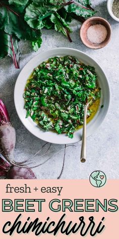 fresh and easy beet greens in a white bowl with a spoon on the side