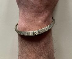 These elegant tribal metal bracelets were handcrafted by craftsmen of the Tuareg tribe, Africa, Sahara desert. They were purchased by me in Mali in 2002, one bracelet is not identical to the other. bracelet thickness: 1.cm Width: internal diameter 7.2 cm Weight: 43 g Tribe: TUAREG (TOUAREG) Region: Algeria, Tunisia, Mali, Libya, Burkina Faso and NigerThe Tuareg are a tribal people of the Sahara who today number more than 300,000 people. They speak a Berber language, Tamarshak, and have their own Adjustable Bohemian Bracelet With Antique Finish, Traditional Adjustable Bronze Bracelets, Bohemian Etched Brass Bracelets, Bohemian Brass Bracelets With Etched Details, Traditional Brass Bracelets With Antique Finish, Traditional Adjustable Bronze Bangle, Adjustable Bronze Traditional Bangle, Adjustable Bronze Bangle In Traditional Style, Traditional Bronze Metal Bracelets