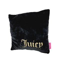 a black velvet pillow with the word juicy printed on it's front and back