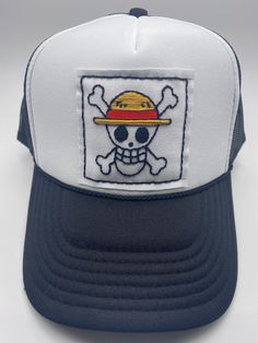 One Piece Jolly Roger (Strawhat Luffy) : 100% Hand Embroidered Patch sewn into a White/Black Trucker hat. Casual Trucker Hat With Embroidered Short Brim, Casual Embroidered Trucker Hat With Short Brim, Black Embroidered Beach Hat, Casual Embroidered Flat Brim Trucker Hat, White Embroidered Patch Hat, Casual Embroidered One-size Hats, Strawhat Jolly Roger, Strawhat Luffy, One Piece Jolly Roger