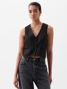 Soft linen-cotton vest.  V-neck.  Sleeveless.  Button front.  * Fit: Slightly fitted.  Sits close to the body.  Hits at the hip.  Note: Oriane Serveille is wearing a Gap Linen Vest, Women Shirt Top, Cotton Vest, Gap Jacket, Sweater Tank Top, Vest Outfits, Work Wardrobe, Time Capsule, Black Linen