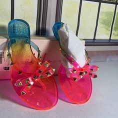 Hello - 40 Stud Bow Tie Sandals Rainbow Women’s Rainbow 8 Pink Fun Sandals For Vacation, Fun Pink Sandals For Summer, Fun Pink Summer Sandals, Multicolor Flat Heel Flip Flops For Spring, Pink Flat Jelly Sandals For Vacation, Fun Slip-on Spring Flip Flops, Summer Party Slip-on Jelly Sandals, Fun Spring Slip-on Flip Flops, Pink Open Toe Jelly Sandals For Vacation