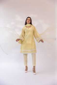 Featuring a butter yellow kurta set in cotton schiffli base detailed with laces. It is paired with matching pants and solid dupatta. Color: BUTTER YELLOW FABRIC: COTTON SCHIFFLI Delivery time 15 to 20 days Yellow Kurta, Pink Wrap, Butter Yellow, Pop Up Event, Matching Pants, Yellow Fabric, Thread Work, Kurta Set, Fabric Cotton