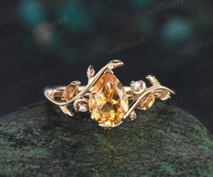 ***It's all about harmony and romance. The citrine ring set will represent your tender feelings and serious intentions in the best way. It features a flowing design with naturally wrapped leaves. Handcrafted from solid gold this engagement ring set features detailed leaves and organic lines wrapped around the central gemstone.***- Metal: Solid gold(10K/14K/18K white/yellow/rose gold),925 sterling silver,platinum available- Main Stone: 6x8mm pear citrine.- Accent Stone: citrines and moissanites- Yellow Citrine Engagement Ring, Branch Wedding Ring, Engagement Ring Nature, Citrine Engagement Ring, Citrine Ring Engagement, Nature Engagement Ring, Hexagonal Ring, Anniversary Ring Set, Yellow Engagement Rings