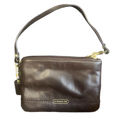 Coach Leather Brown Wristlet. It’s Been In A Storage Bin. 4x6 Classic Clutch Bag With Wrist Strap, Elegant Leather Rectangular Wristlet, Coach Leather Wristlet With Zipper Closure, Leather Wristlet With Removable Pouch, Classic Formal Bags With Wrist Strap, Formal Brown Wristlet With Wrist Strap, Elegant Brown Wristlet For Evening, Elegant Brown Evening Wristlet, Classic Clutch Wristlet With Zipper