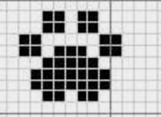 a cross stitch pattern with black squares on white paper, which has been drawn in the shape of a heart