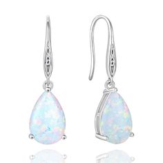 PRICES MAY VARY. ♥The teardrop earrings are well crafted in 925 sterling silver and created opal.We offer lead free, nickel free and hypoallergenic jewelry that are safe to wear. ♥Celtic knot hook earrings size: 29.5 x 8mm(1.17 x 0.32in), main stone size: 8 x 12mm. The dangle earrings is inlaid with created opal for a unique look.Irish earrings exudes a charming atmosphere, noble and more attractive. ♥ Solitaire gemstone earrings are comfortable and practical to wear every day, sweet and glitter Irish Earrings, Blue Opal Earrings, October Birthstone Jewelry, Irish Jewelry, Hypoallergenic Jewelry, Birthstone Earring, Valentines Jewelry, October Birthstone, Opal Earrings