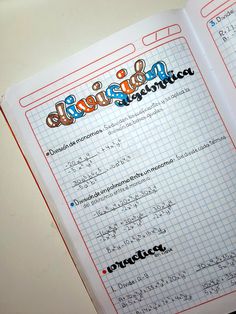 an open notebook with some writing on the page and numbers in it that are written out