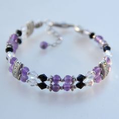 This unique bracelet is handmade using semi precious stone amethyst. We also have a variation of jade. The length of the bracelet is 7-8 1/4 inches. ;-) Enter my shop here: http://www.etsy.com/shop/AniDesignsllc?ref=pr_shop_more ;-) My contact number: 626-379-1904. Please contact me if you would like to order multiples or customize a design for your special event, I will be pleased to give you a discount on a quantity order. ;-) Purchases will be shipped within 1-3 business days. In case of occa Purple Beaded Birthstone Bracelets For Gift, Purple Beaded Birthstone Bracelets As Gift, Purple Birthstone Beaded Bracelets For Gift, Purple Birthstone Beaded Bracelets As Gift, Handmade Lavender Crystal Bracelet Gift, Elegant Purple Birthstone Beaded Bracelets, Lavender Amethyst Crystal Bracelet As Gift, Purple Hypoallergenic Crystal Bracelet Gift, Adjustable Purple Bracelet For Anniversary