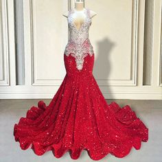 Unveil your inner goddess with our exquisite Red Sequin Mermaid Gown. This stunning masterpiece is meticulously adorned with shimmering sequins that catch the light with every movement, creating a dazzling effect that ensures you won't go unnoticed. The deep V-neckline and intricate beaded detailing at the bodice add a touch of elegance and sophistication, making it the perfect choice for any grand event or special occasion.The mermaid silhouette hugs your curves in all the right places, flaring Glamorous Sparkling Mermaid Dress For Wedding, Glamorous Wedding Mermaid Dress With Sparkles, Sparkling Mermaid Dress For Wedding, Glamorous Sequin Mermaid Hem Dress For Wedding, Glamorous Sequin Mermaid Hem Wedding Dress, Glamorous Mermaid Sequin Dress For Wedding, Red Mermaid Dress With Mermaid Hem For Prom, Glamorous Sequin Wedding Dress With Mermaid Hem, Glamorous Fishtail Sequin Wedding Dress