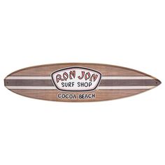 a surfboard with the name ron jon surf shop on it's front and side