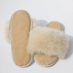 Delight yourself or someone else with these gorgeous alpaca fur slippers that feel like fluffy little clouds on your feet. These slippers are perfect for traveling, as they're lightweight, pack flat and come with a Fluff Alpaca muslin bag. Despite their light weight, they envelope your feet in a deep cushion of alpaca fur, merino lambskin and suede for added natural softness and durability. Ideal for both transitional weather and through the winter months. Designed in Scotland by Samantha Holmes Lavander Candle, Alpaca Slippers, Fig Candle, Fur Sliders, Handmade Slippers, Pet Brush, Muslin Bags, Slow Fashion Brands, Fuzzy Slippers