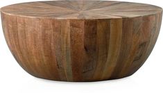 a wooden bowl that is made out of wood and has a circular design on the top