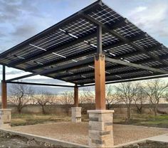 an outdoor structure with solar panels on the roof