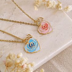 Handcrafted with the utmost care, this enamel rose heart necklace is the sweetest way to keep a feeling of love close to your heart. Perfect to be shared with your best friend, or to be given as a gift to a special person, to your mother, to your sister or why not, to your bridesmaids, the necklace can be personalized with an initial for an even more unique and special touch. The chain is in 14k gold plated stainless steel, the pendant measures 16x16mm and is in 14k gold plated brass with your c Rose Heart Necklace For Valentine's Day, Enamel Heart Pendant Necklace For Gift, Enamel Heart Charm Necklace For Valentine's Day, Rose Heart-shaped Necklace For Gift, Enamel Heart Charm Necklace For Gifts, Valentine's Day Gift Enamel Charm Necklaces, Valentine's Day Gift Enamel Charm Necklace, Valentine's Day Rose Heart Necklace, Valentine's Day Gift Enamel Heart Necklace