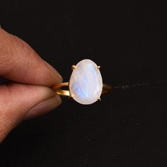 Natural Rainbow Moonstone 18k Gold Plated Sterling Silver Ring, Blue Flashy Moonstone Ring, June Birthstone Ring, Healing Crystal Ring, Dainty Ring, Promise Ring, Anniversary Gift, Wedding Ring, Engagement Ring, Gift For Him, Gift For Her Ring, Valentine Gift Jewelry. Item Made With Pure 925 Sterling Silver and Nickel, Cadmium Free. We accept customisation contact us For Custom orders.  Product Detail :  Metal :  925 Sterling Silver Gemstone : Rainbow Moonstone Weight : Approx 2.80 Gm. << About Valentine Gifts Jewelry, Gold Moonstone Ring, Healing Crystal Ring, June Birthstone Ring, Fire Rainbow, Ring Crystal, Zierlicher Ring, Rainbow Moonstone Ring, Ring Stacking