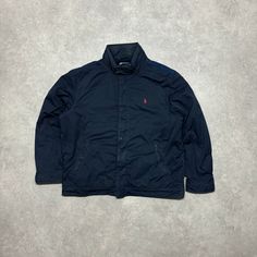 Vintage Polo Ralph Lauren navy fleece lined nylon jacket  Size - X-Large Width - 27' Length - 29' Navy Windproof Long Sleeve Outerwear, Navy Long Sleeve Windproof Windbreaker, Navy Long Sleeve Weatherproof Windbreaker, Casual Navy Fleece Jacket With Fleece Lining, Weatherproof Long Sleeve Navy Outerwear, Navy Long Sleeve Weatherproof Outerwear, Navy Fleece-lined Outerwear For Streetwear, Long Sleeve Nylon Windbreaker With Fleece Lining, Mens Navy Jacket