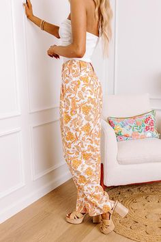 - These adorable paisley pants are as bright as your smile! - Unlined linen blend material with an orange, blue, and green hued paisley print - A high waistline with wide belt loops, a hidden zip fly, and button closure - Pleated detailing - Functional side pockets - Optional back pockets that can be unstitched for functional use - A relaxed silhouette that ends in straight hemlines Paisley Pants, Linen Blend Pants, Your Smile, Wide Belt, Blue And Green, Paisley Print, Linen Blend, Paisley, High Waist