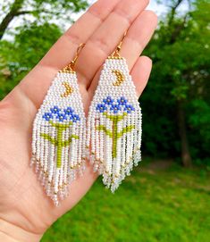 White fringe earrings with moon Blue daisy earrings Beaded jewelry with flowers Dangle boho earrings Gold half moon earrings Pearl jewelry READY TO SHIP! The earrings are handmade from Toho Japanese beads using a strong synthetic thread, a clasp of hypoallergenic metal. Length with a clasp - 4.1 inch Width earrings - 1.25 inch It will be a great gift, I send all jewelry in gift wrapping. Please note: do not wear beaded jewelry during active sports, swimming, and sunbathing. Do not put perfume an Spring Dangle Beaded Earrings, Bohemian Beaded Flower Earrings For Spring, Bohemian Jewelry With Dangling Beads For Spring, Bohemian Spring Jewelry With Dangling Beads, Spring Bohemian Beaded Flower Earrings, Spring Dangle Jewelry With Dangling Beads, Spring Bohemian Beaded Dangle Earrings, Bohemian Spring Jewelry For Jewelry Making, Bohemian Flower Dangle Earrings For Summer