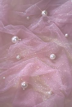 pink tulle with pearls and sparkles on it