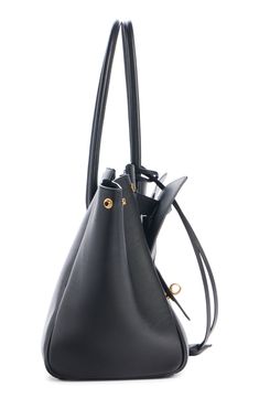 A new icon entered the Balenciaga pantheon of bag styles on the fall '24 runway—the Bel Air crafted from smooth calfskin leather and shaped for shifting with snap side gussets and an almost Escheresque front panel of exterior pockets. Open top Shoulder straps Exterior pockets Structured silhouette with flat base and protective metal feet Leather Made in Italy Designer Handbags Everyday Luxury Faux Leather Satchel, Luxury Everyday Faux Leather Satchel, Luxury Travel Bucket Bag With Gold-tone Hardware, Luxury Soft Leather Bucket Bag For Daily Use, Luxury Black Bucket Bag For Business, Luxury Black Business Bucket Bag, Black Epsom Leather Satchel Shoulder Bag, Black Calf Leather Bucket Bag For Daily Use, Black Calf Leather Bag With Removable Pouch