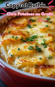 a casserole dish with cheese and parsley on the top in a red bowl