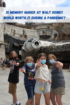 four girls wearing face masks in front of a star wars vehicle with the words is memory maker at walt disney world worth it during a pandemic?